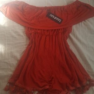 Off the shoulder tassel romper